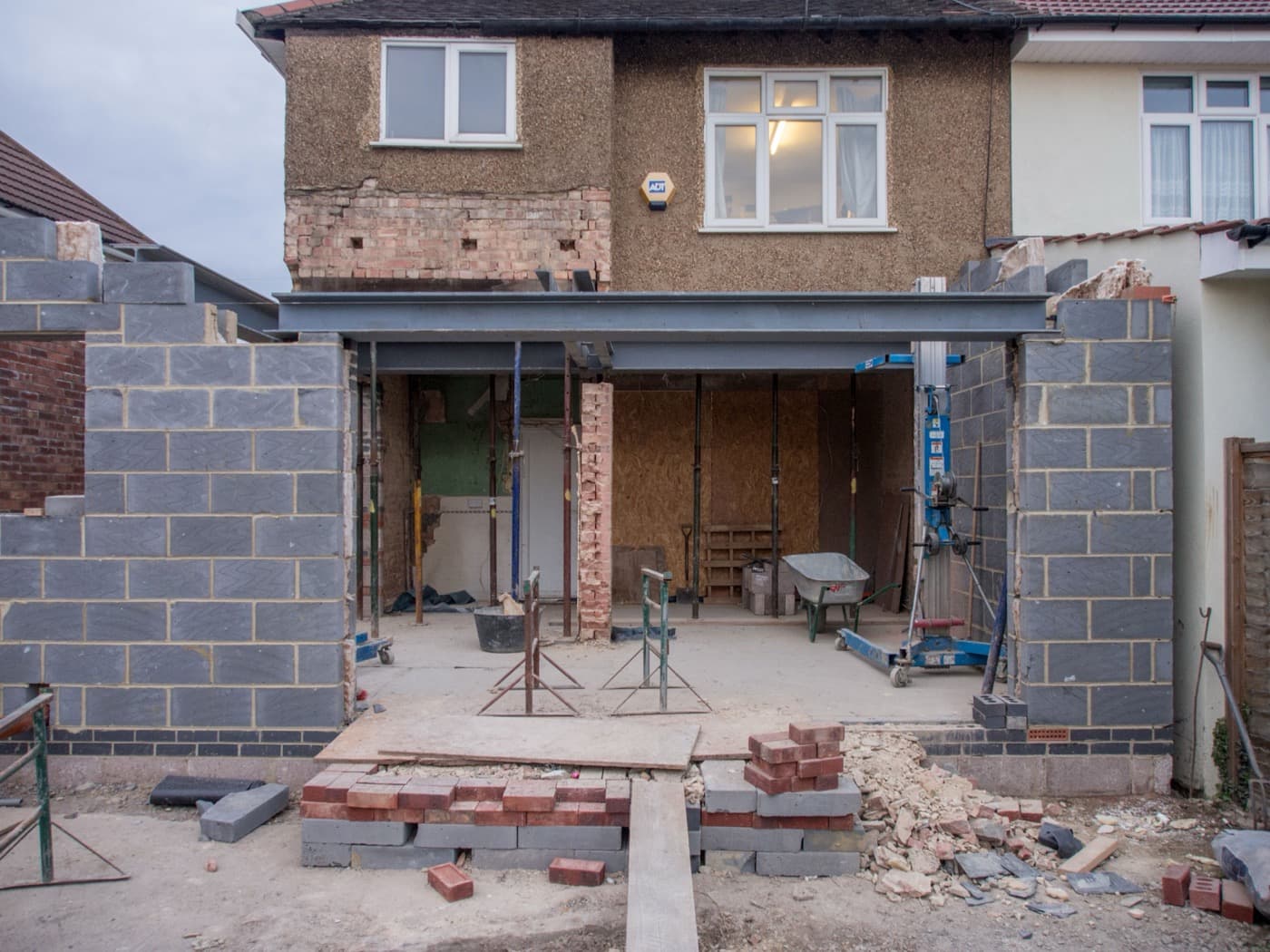 New home addition under construction, tied into the existing house structure